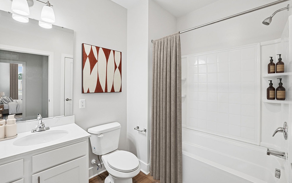 bath with toilet tub and sink