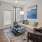 Living area with beige couch at Attain at Bradford Creek apartments in Huntsville, AL.