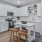 Kitchen with white cabinets at Attain at Bradford Creek apartments in Huntsville, AL.