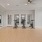 a yoga room with a wood floor