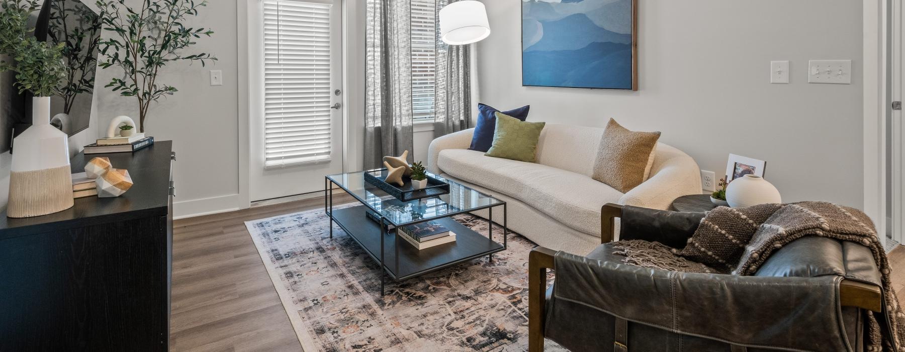 a living room with a couch and a coffee table